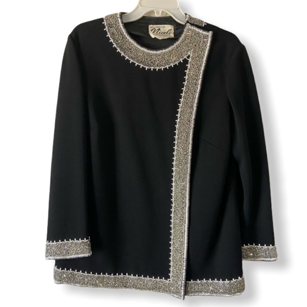 Stunning vintage 60’s wool coat with beading
